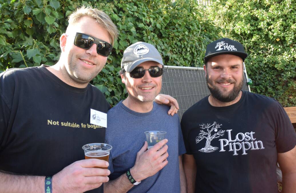 FRESH HOP: Moo Brew General Manager Dave Macgill, Hobart Brewing Co.'s Brendal Parnell and Lost Pippin's Mark Robertson talk shop. Picture: Alicia Barker.