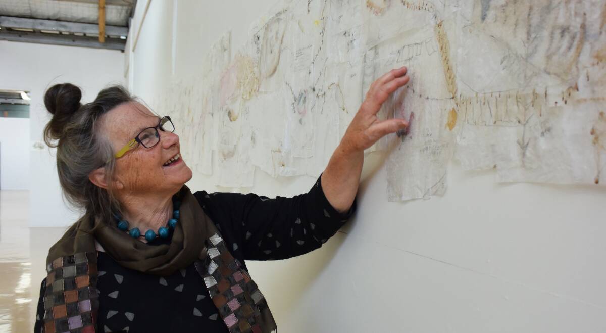 MAPPING: Artist Mary Peacock with The Walking Project (2015), an imaginative map of the Abbotsford Convent. Picture: Alicia Barker