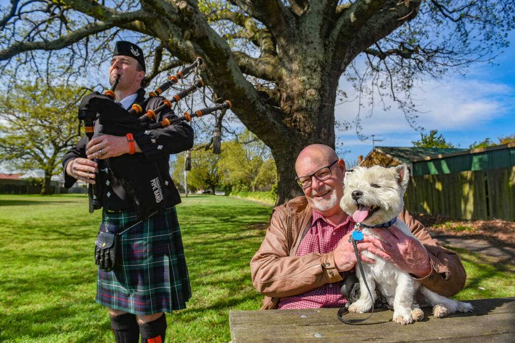 Tuning: John Ralph of the Caledonian Pipe band and barotone Peter Aberg with Tavish the dog getting ready for Music in the Churches. Picture: Paul Scambler