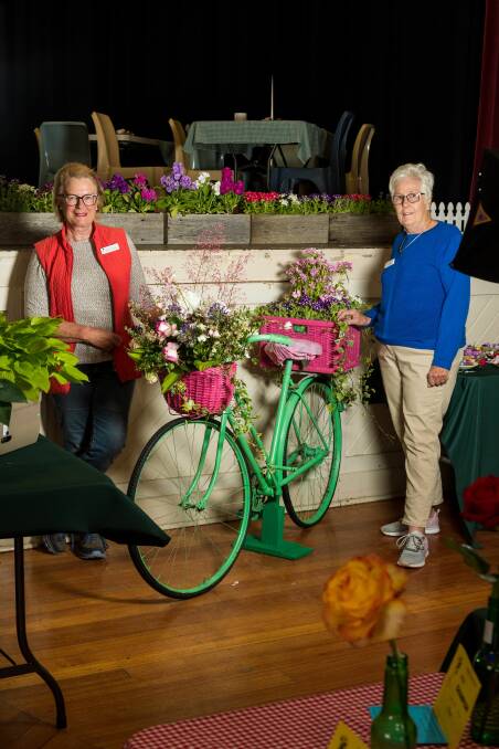 Blooming: Longford Garden Club President Toni Burton and member Marcia Telford at the Longford Spring Flower Show. Picture: Phillip Biggs