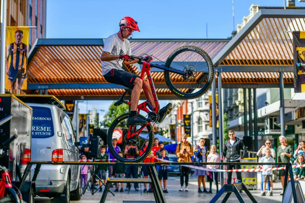 Borys Zagrocki of Extreme Bicycle Stunts thrilled the crowd at the Bikes in the Mall pre EWS event . Picture: Scott Gelston