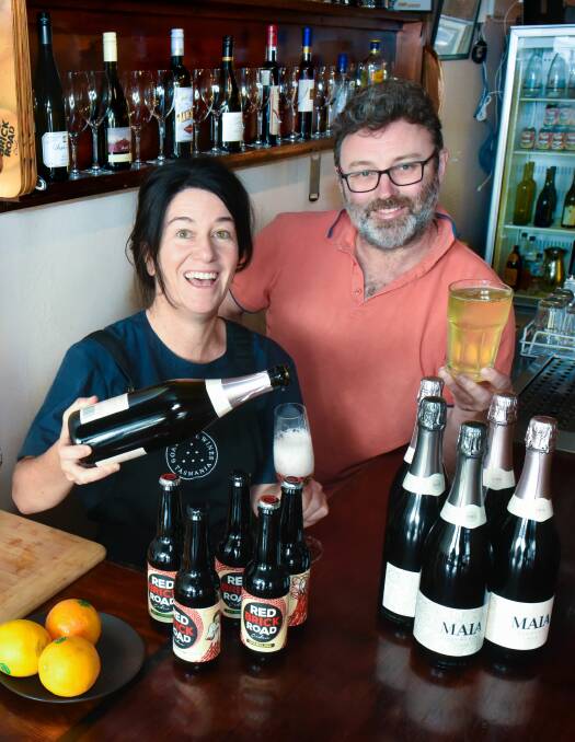 Sparkling: Red Brick Road Cider's Corey Baker and Goaty Hill's Natasha Nieuwhof getting ready for Beerfest. Picture: Neil Richardson