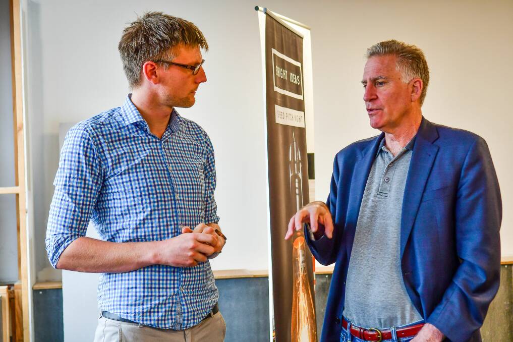 Ambassadorial advice: United States Charge d’Affaires James Carouso with Adam Mostogl at Cowork Launceston. Picture: Scott Gelston. 