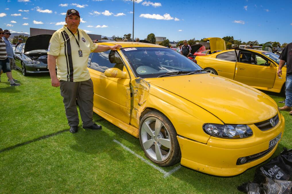 Jim Petrou of Adelaide with his damaged Monaro. Windsor Park. Picture: Paul Scambler.