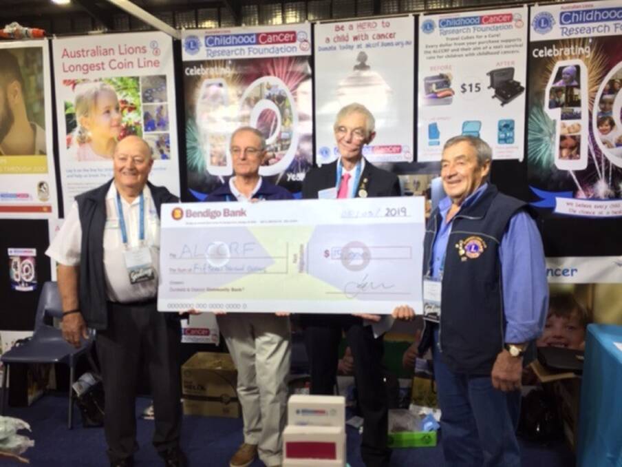 Support: Club secretary Tony Rony and president Tony Bennett presenting a cheque at the National Club Convention, Geelong. Picture: supplied