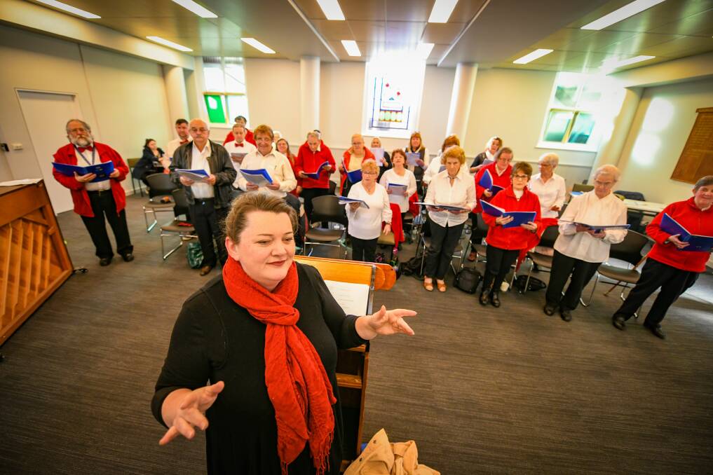 Sing: Choir of High Hopes conductor Sharyn Martin with the choir. Picture: Paul Scambler