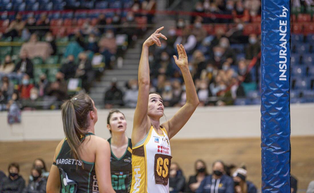 REACH: Ashlea Mawer sinks a shot against the Cavaliers during last weekend's match at the Silverdome. Pictures: Craig George