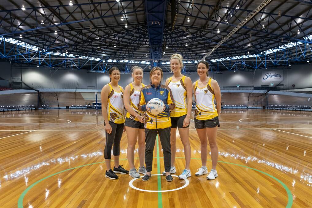 OUT: Hawks Jamie Symons, Lauren Spencer, coach Kellie Woolnough, captain Danni Pickett and Tessa Coote. Picture: Craig George