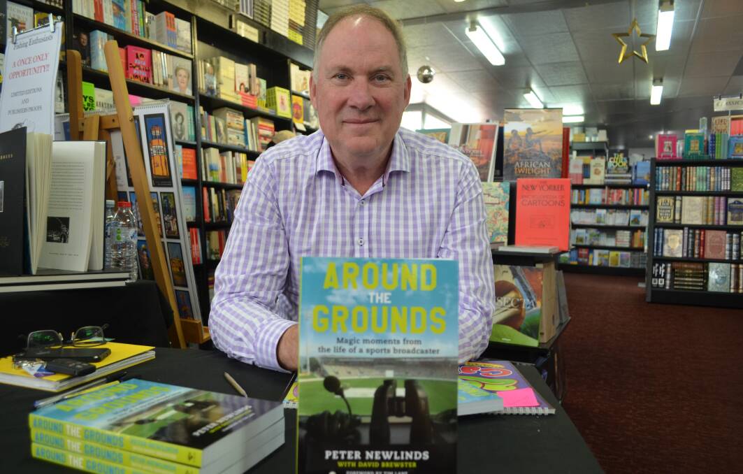 Grandstand: Peter Newlinds with his new book Around the Grounds at Petrarchs Launceston. Picture: Harry Murtough.
