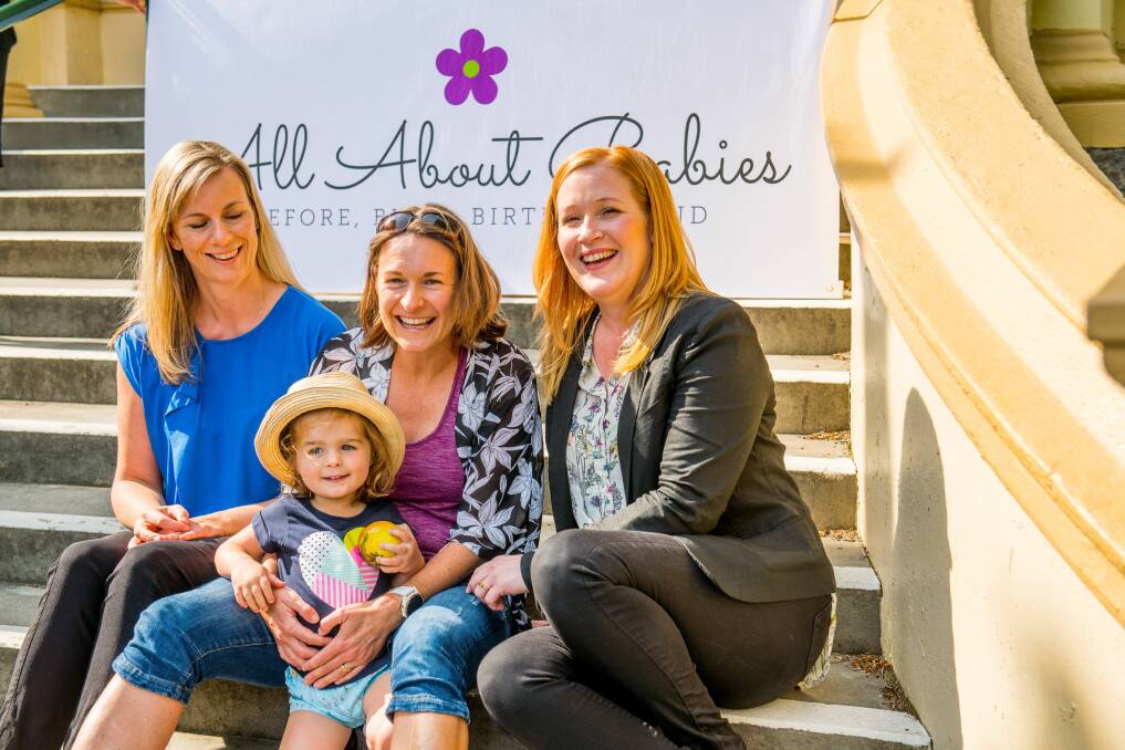 Child's play: Zoe Freshwater, Louise and Chloe Padgett, 3, and Madeleine Rose at the All About Babies launch. Picture: Scott Gelston