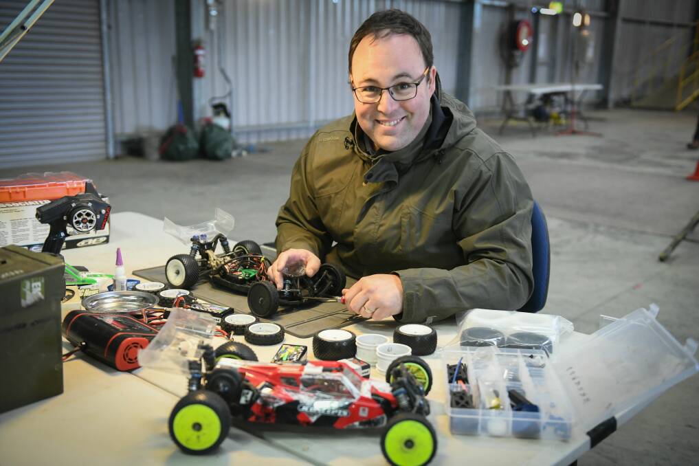 Richard Green , organiser of the Tasmanian Electric Off Road Titles at Quercus Rural Youth park, Carrick prepares his car. Picture: Paul Scambler. The Examiner.