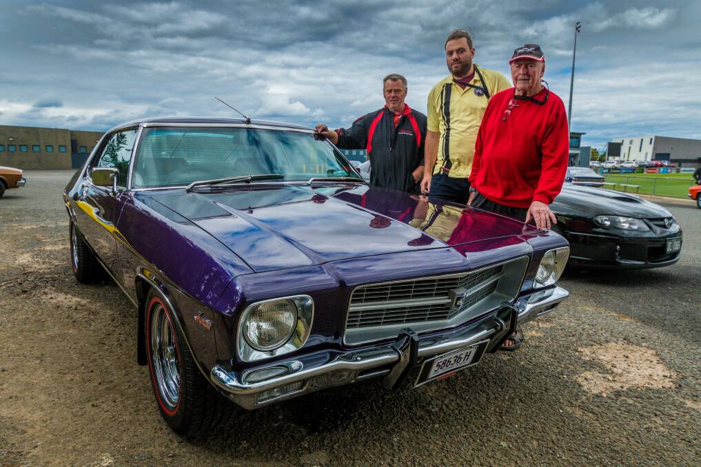 Generations: Phillip, James and Brian Cooper, with their HQ Monaro. They're among the 200 Monaro owners ready to show their cars on Saturday. Picture: Phillip Biggs.