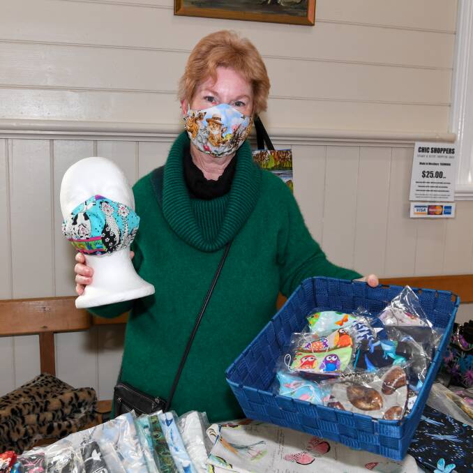 Stitch-up: Stallholder Sarah Moss with her two-layered cotton masks at the Carrick Social Group Market. Picture: Neil Richardson