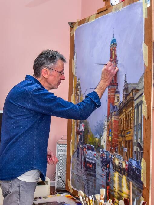 Work of art: Artist Brad Quinn of Westbury at work in his studio. Quinn was awarded a highly commended from the Greater Western Tiers Art Awards. Picture: Neil Richardson