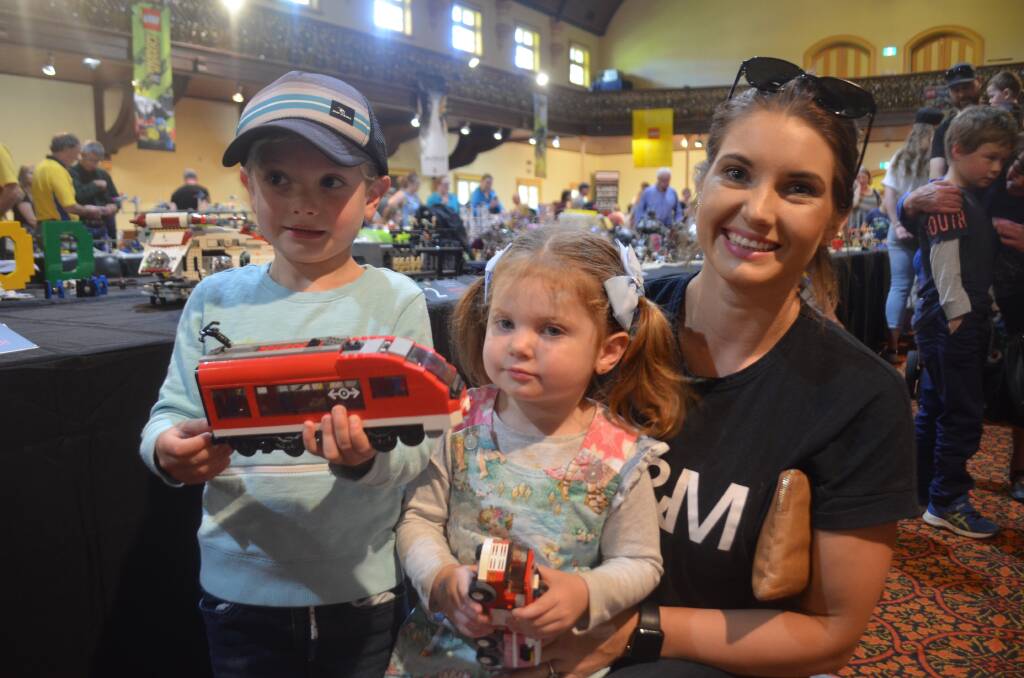 Lego-fever: Max, 5, Piper-Rose, 3 and Renee Parry of Launceston playing with some of the fabulous lego creations. Pictures: Harry Murtough