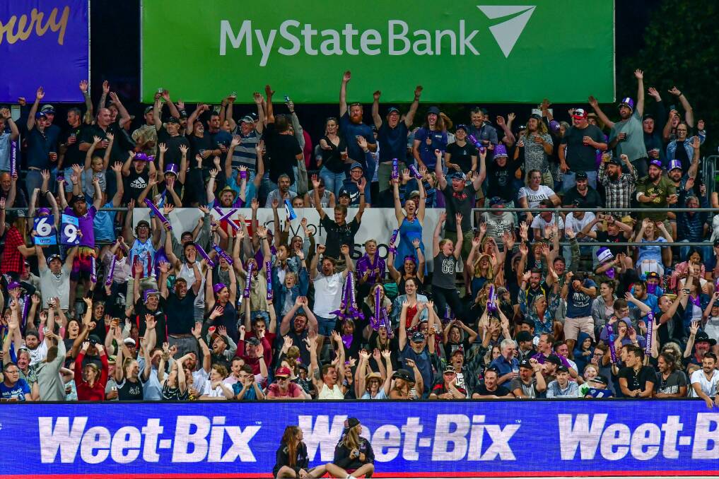 Cane power: Mexican waves in the crowd during the BBL game between Hobart Hurricanes and Perth Scorchers in Launceston. Picture: Scott Gelston 