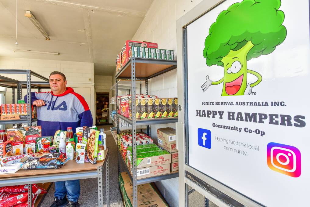 Hamperific: Happy Hampers co-director Andrew Hicks at the storefront of Happy Hampers in Youngtown. Picture: Scott Gelston