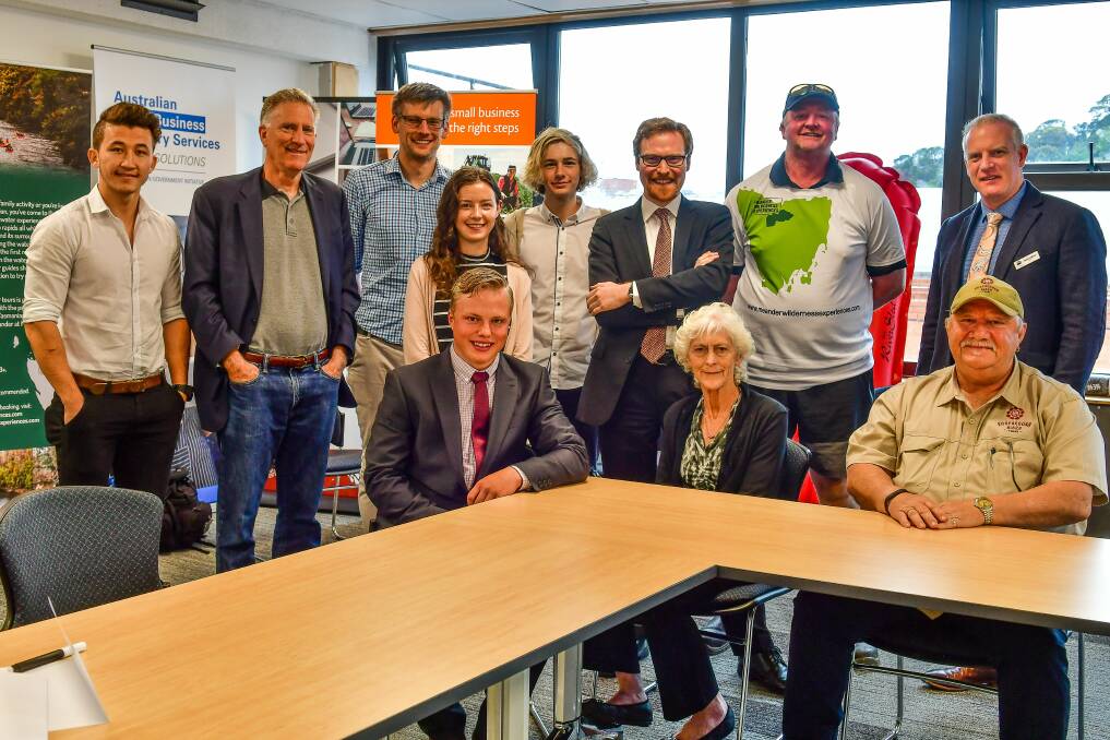 United States Charge d’Affaires James Carouso, second from left, with local entrepreneurs at Cowork Launceston. Picture: Scott Gelston.