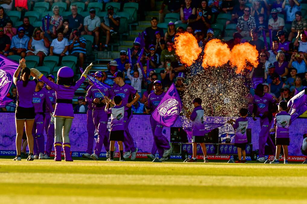 Purple power: A fiery entry for the Hobart Hurricanes during their last game at UTAS Stadium. Picture: Scott Gelston