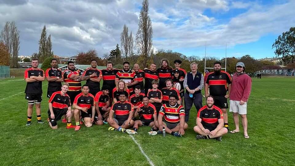 TIGER PRIDE: Elijah Agaiava (fourth on back right) and father Tua (back centre) with the Tigers championship division team. Picture: Facebook