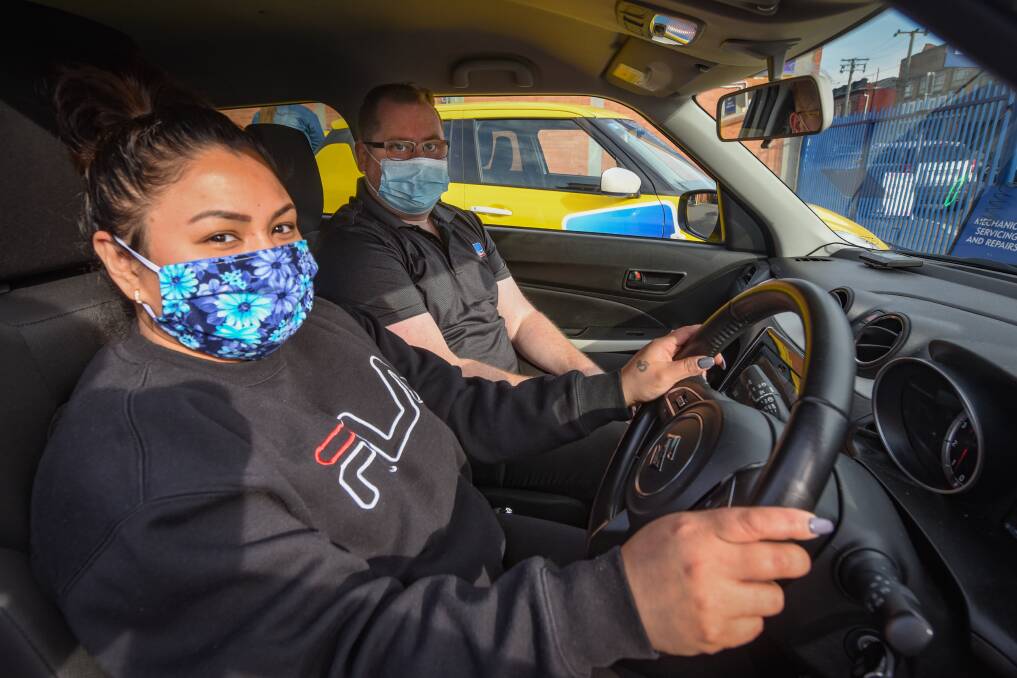 Learner driver Deeba Jayabel of Launceston with RACT driver trainer Hamish Coupe. Picture: Paul Scambler