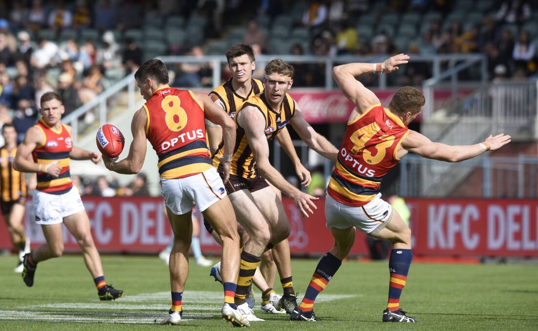 CLASH: About 9000 fans attended the match between the Hawks and Crows in April. Picture: Craig George