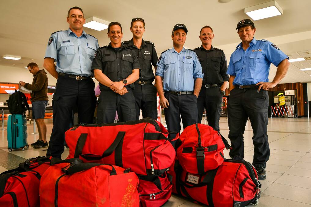 Mateship: Launceston brigade's Anthony Goss, Jim Preece, Nic Rowbottom, Claude Road's Callum Woodham, Launceston's Dave Stebbeings and Burnie's Tim Potter are off to help with the fire efforts in Queensland. Picture: Scott Gelston