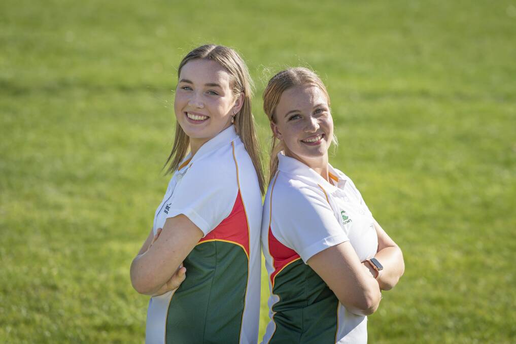 Home team: Queechy Penguins Amelia Duffy, 16 and Izzie McRobbie, 18 are ready to represent their state in Launceston. Picture: Craig George