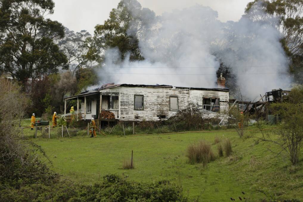 Up in flames: The fire that destroyed Mr and Mrs Moxham's Rowella Road home, Sidmouth. Picture: Matt Dennien