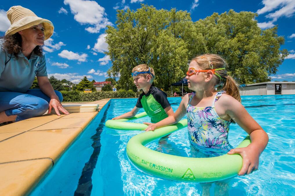 Water safety: Dustin (10) and Jasmine (7) Coles, of Hagley, with Auswim instructor Kali Bierens. Picture: Phillip Biggs