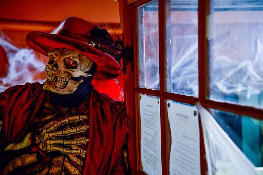 SPOOKY: Dean Cocker, as Red Death, gets ready for Penny Royal's Halloween party this weekend. Picture: Scott Gelsto
