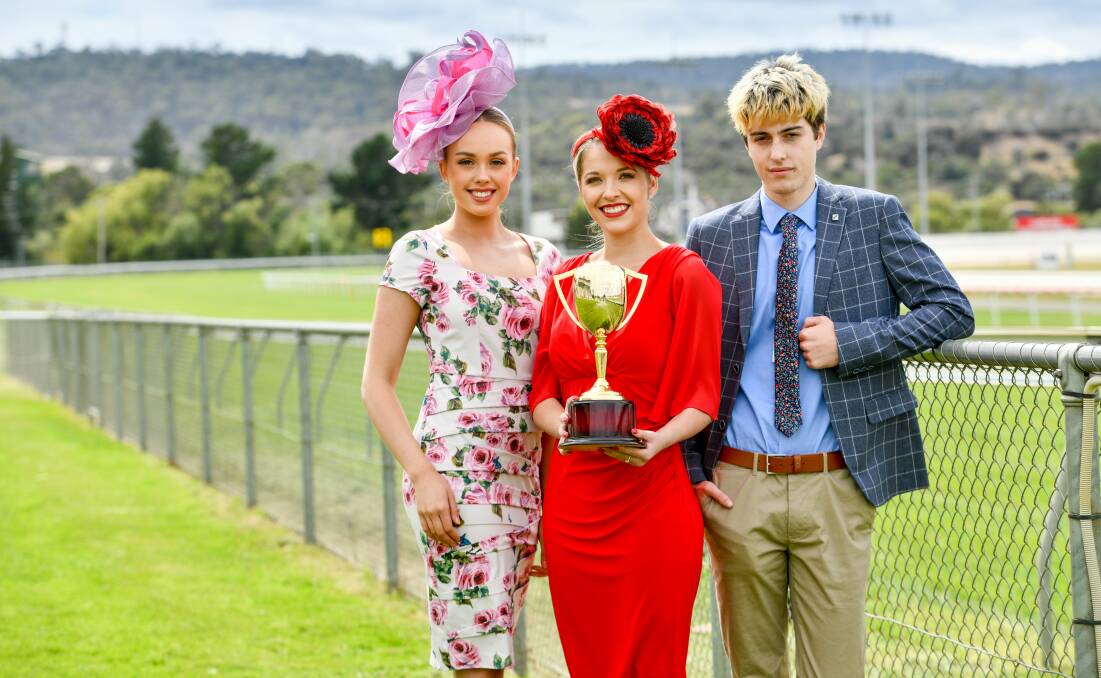 Glamour: Sorayah Woods, Chelsea Freestone and Ash Carroll with the 2020 Launceston Cup. Picture: Scott Gelston