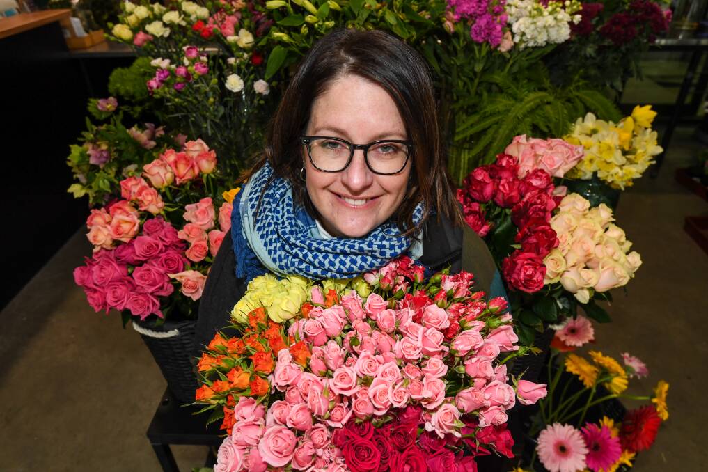 Flowering: Tamar Valley Rose Shop owner Megan Lee at the new location of the shop next door. Picture: Neil Richardson