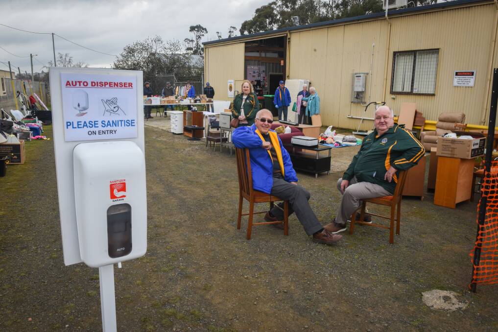 Roaring back: Lions Club of Kings Meadows president Dennis Mann and Lions District Governor Byron Dilworth at the Kings Meadows club rooms garage sale Picture: Paul Scambler.
