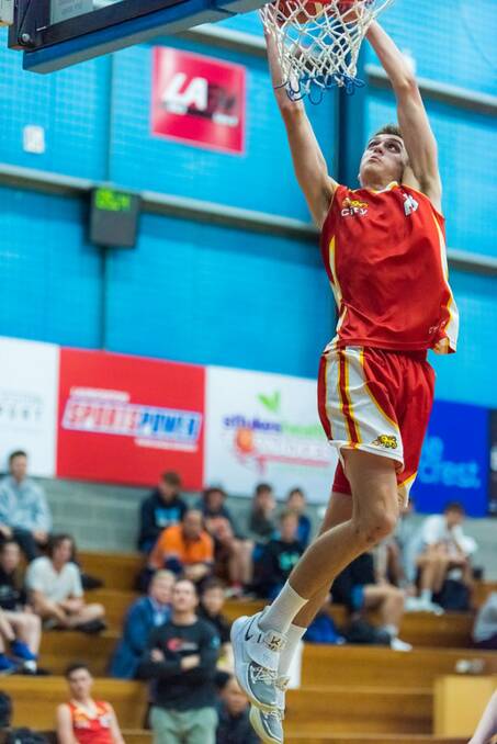 Riot: Lachlan Maynard of Launceston at the state under-18 championship. Pictures: Simon Sturzaker