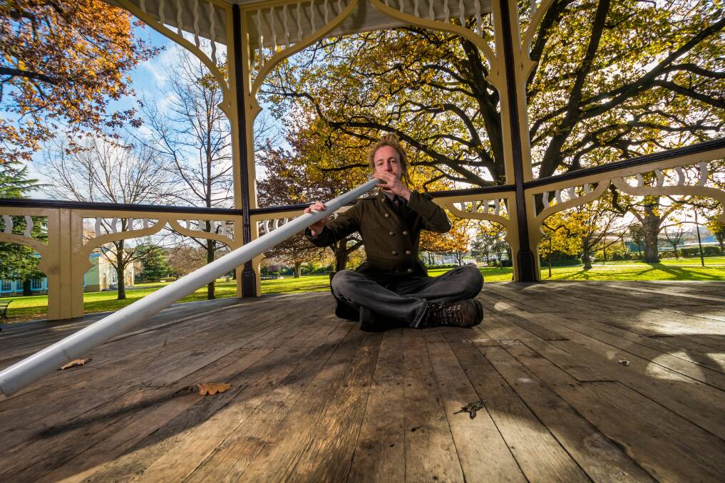 Hannes Reck does didgeridoo meditation, pictured at City Park, Launceston. Pictures: Phillip Biggs