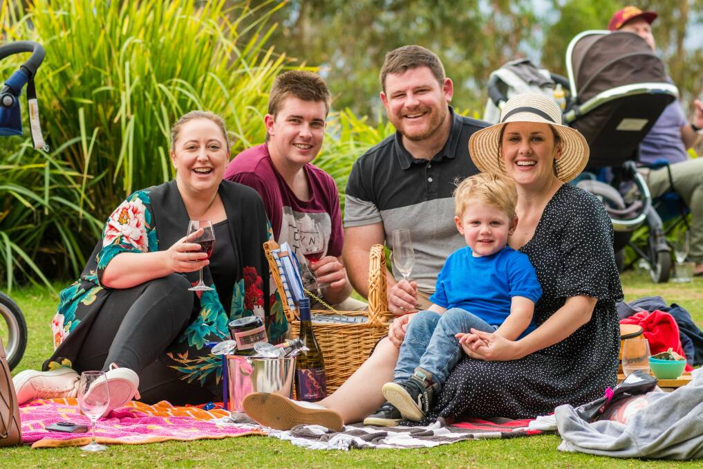 Pinot Easter: Kylie Harrison and Ben Linnett, of Wollongong, and Matthew and Katherine Kent and 3 yo Harry, of Invermay. Picture: Phillip Biggs