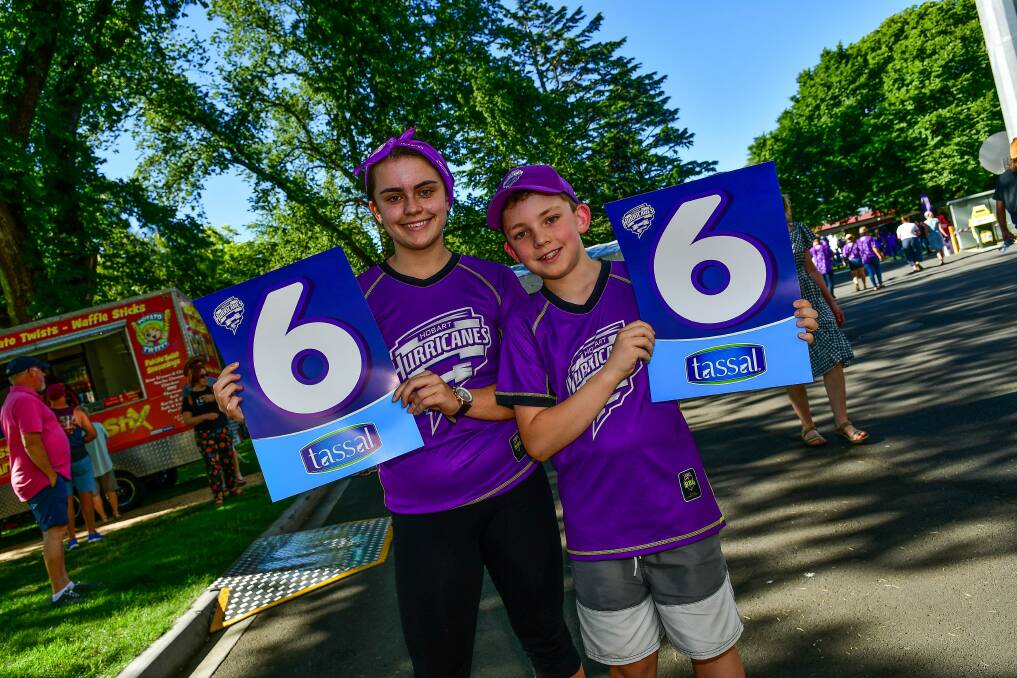 Burnie's Sophie, 13, and Ben Ready, 9 during the BBL game between Hobart Hurricanes and Perth Scorchers in Launceston. Picture: Scott Gelston