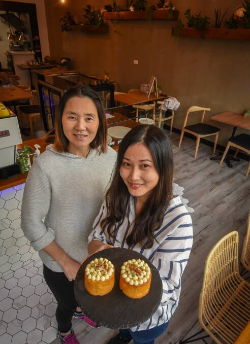 Open for business: Monsoon Cafe and Restaurant chef Tanya Thananchaithiti with owner Yaya Waite the cafe in Charles Street, Launceston. Pictures: Paul Scambler