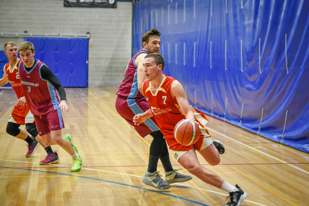 MACHINE: Sejr Deans moves into the paint. He dropped 57 points on the Rebels. Pictures: Craig George