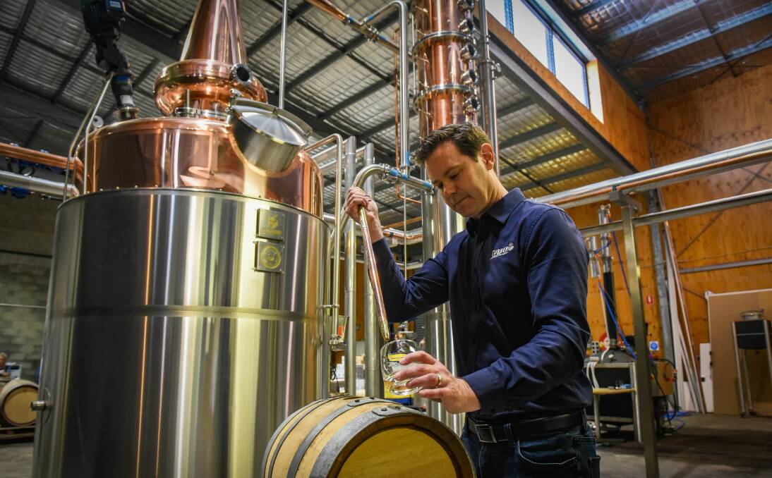 Liquid gold: Turner Stillhouse founder Justin Turner in front of the Whisky still. Pictures: Paul Scambler.