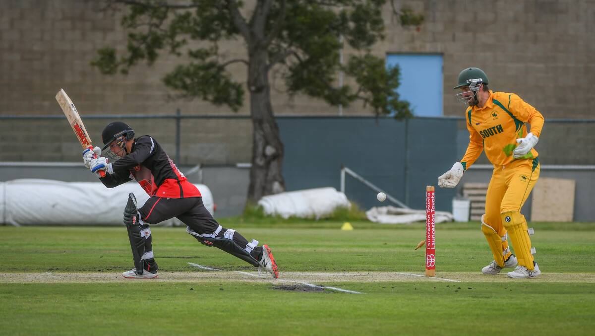 STRIKE: South Launceston wicket-keeper Nathan Philip attempts to stump Ulverstone's Jack Pearce. Picture: Paul Scambler