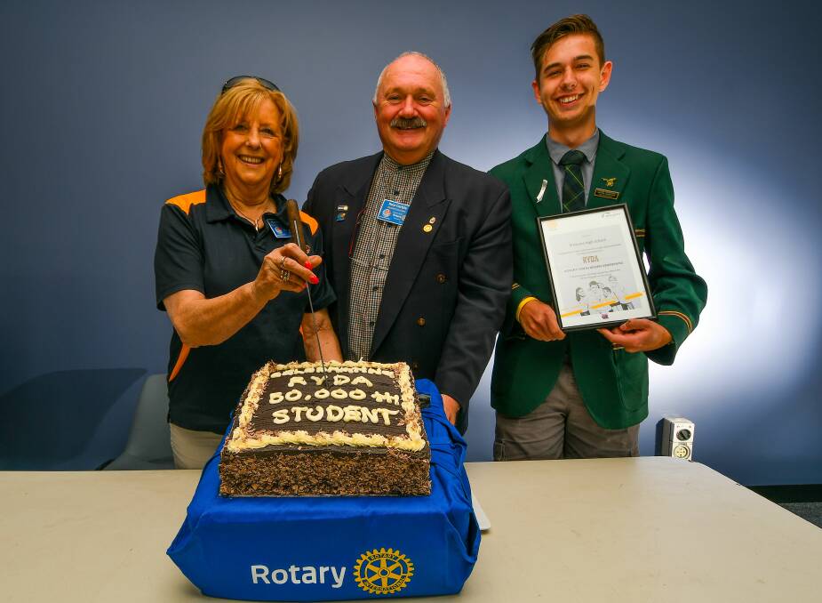 RYDA's Marion Cooper and Rotary district governor Ross Carlyle were on hand as Prospect High School student Hayden Johnstone became the 50,000th program participant at Symmons Plains. Picture: Scott Gelston.
