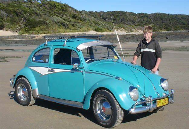 Fourteen-year-old William Holmes with his restored 1963 VW Beetle from The Examiner's archive. Picture: file