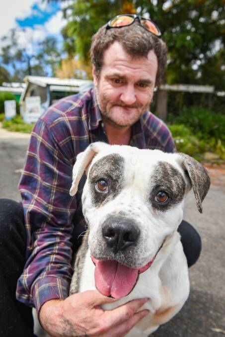 Puppy love: Maximus, is adopted from the Launceston RSPCA by Daniel Drummond of Launceston, Picture: Paul Scambler