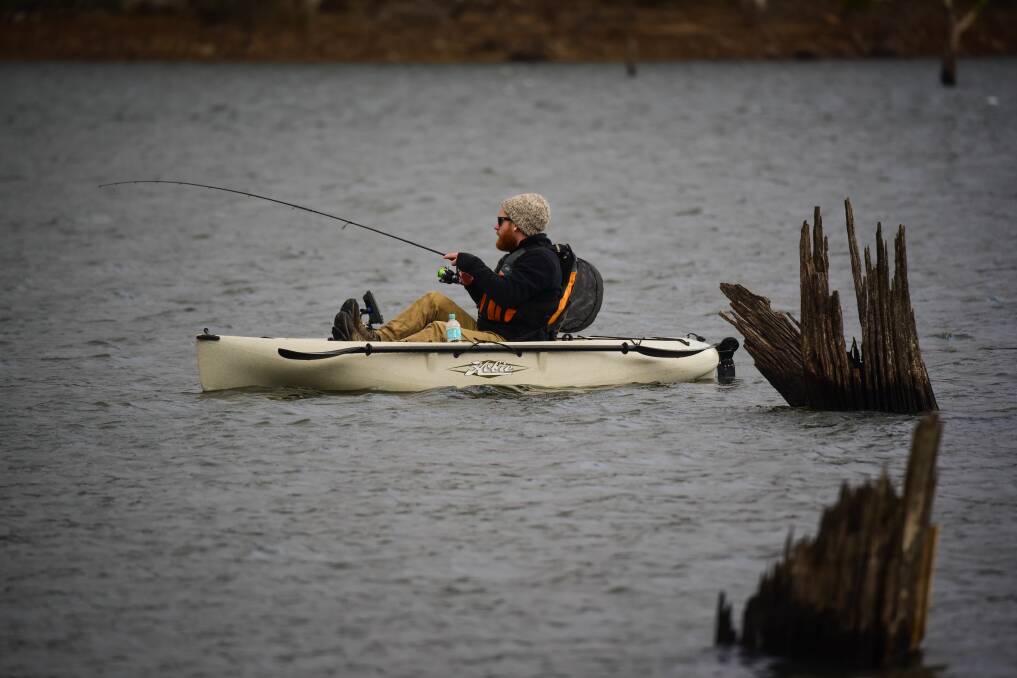 Frosty fishing: Calhoun Fifis, of Hobart, fishing in Lake Leake. Picture: Paul Scambler