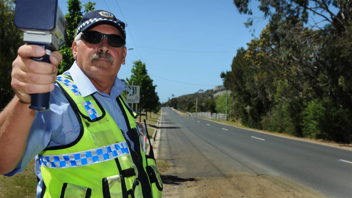 Constable Allan Skeggs of Bicheno Police out on radar duty on the outskirts of Bicheno