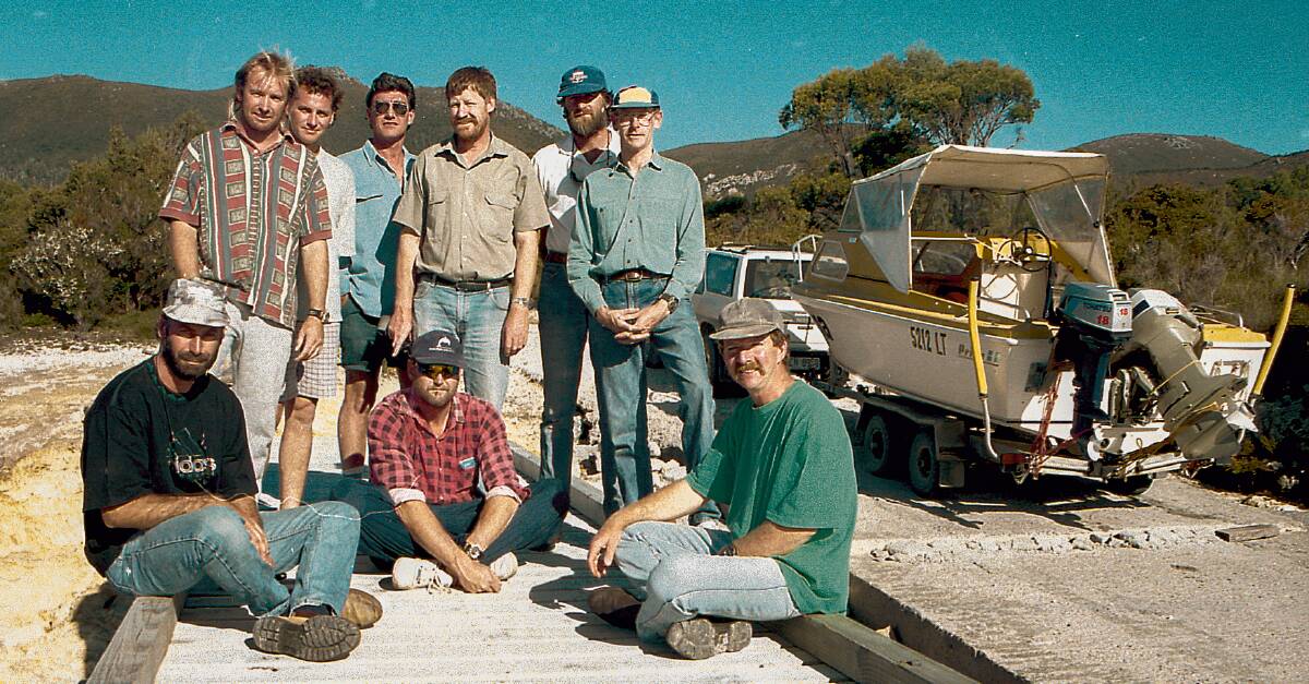 11 February 1995: Lake Pedder. Ocean Divers plus club members who took part in the Sunday Examiner project to see if there was still sand on the beach, are Wilson Forward, Michael Skipper, Rob Meyer (dec), Reg Hutton, Geoff Stubbs, Ian Gillespie and seated: John Kilby, Robert (Bob) Goss (dec), and Rob Goddard 