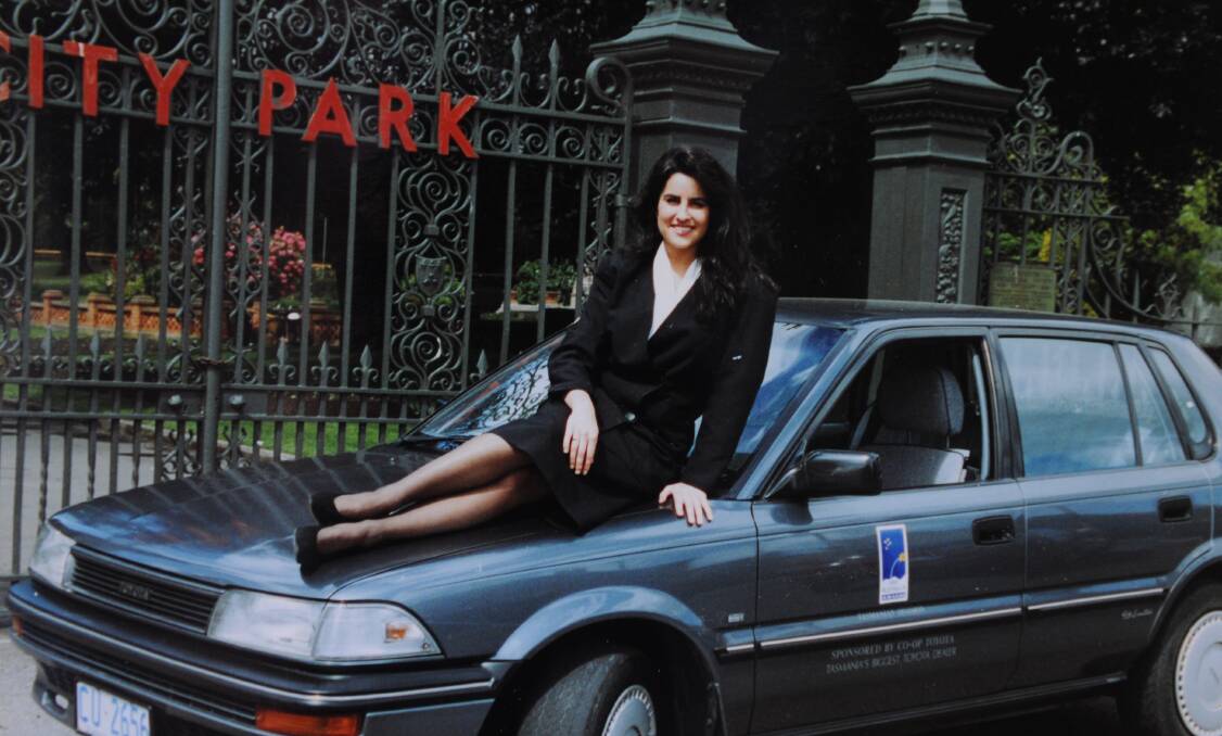 Jo Palmer (nee Cornish) as Miss Australia in front of Launceston's city park gates. 1993.