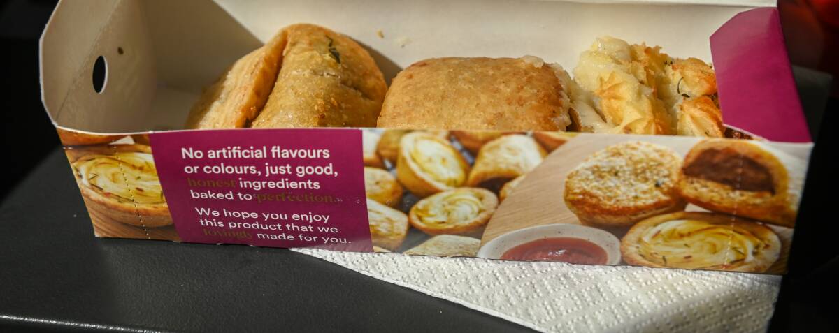 Snack time, a box of different pies 